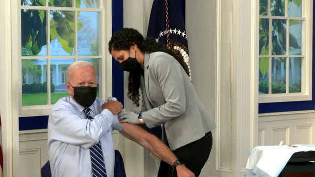 President Biden While Receiving a COVID-⁠19 Booster Shot